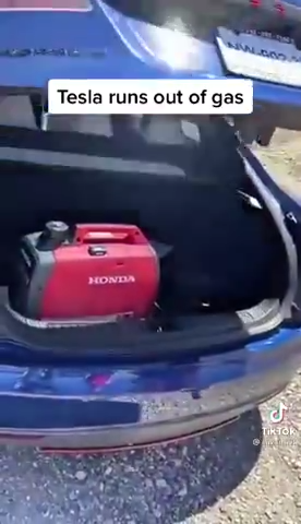 Tesla car runs out of charge so man fills petrol generator up with gas to charge it up 10-6-2022